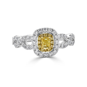 0.27ct Yellow Diamond ring with 0.47tct accent diamonds set in 18K two tone gold