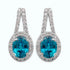 5.33ct Blue Zircon Earrings With 0.56tct Diamonds Set In 14kt White Gold
