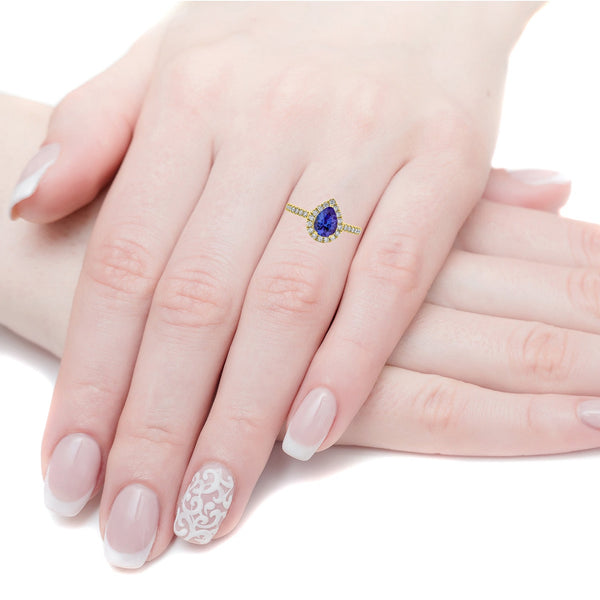 1.27ct Tanzanite ring with 0.43tct diamonds set in 14K yellow gold