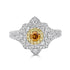 0.20ct Orange Diamond ring with 0.67tct diamond accents set in 14K two tone gold