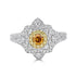 0.20ct Orange Diamond ring with 0.67tct diamond accents set in 14K two tone gold
