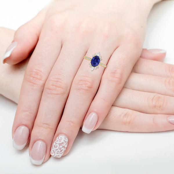 2.3ct Sapphire Ring with 0.48tct Diamonds set in 14K Yellow Gold