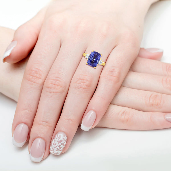 6.14 Tanzanite Rings with 0.41tct Diamond set in 18K Yellow Gold