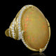 11.82ct Opal Ring with 0.46tct Diamonds set in 14K Yellow Gold