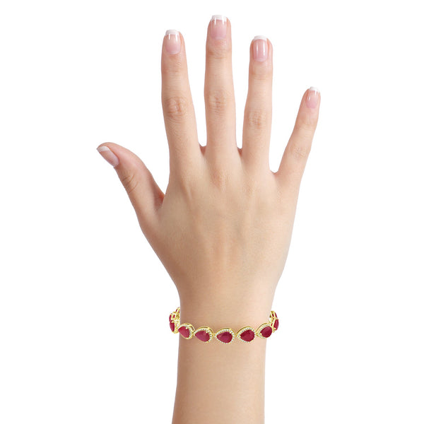 30.31tct Ruby Bracelet with 2.01tct Diamonds set in 14K Yellow Gold