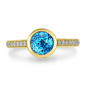 2.3ct Blue Zircon Ring with 0.16tct Diamonds set in 14K Yellow Gold