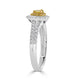 0.18ct Yellow Diamond ring with 0.46tct accent diamonds set in 18K two tone gold