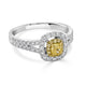 0.31ct Yellow Diamond ring with 0.57tct accent diamoidns set in 18K two tone gold