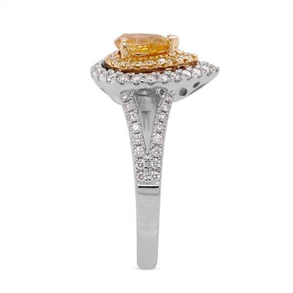 0.50ct Yellow Diamond ring with 0.57tct diamonds set in 18K two tone gold