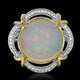 9.35ct Opal Ring with 0.16tct Diamonds set in 14K Two Tone Gold